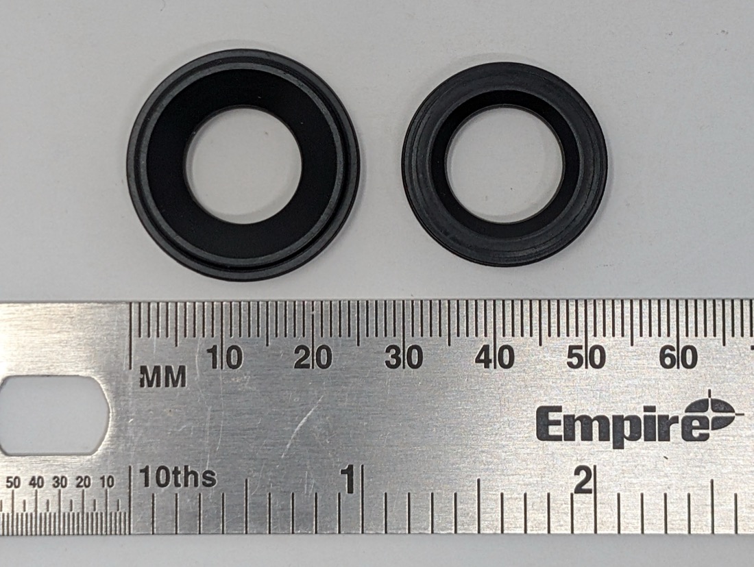 Bolt stop comparison, face-on — Ion 1.0/2.0 (left) vs. Ion XE (right), bore size difference visible