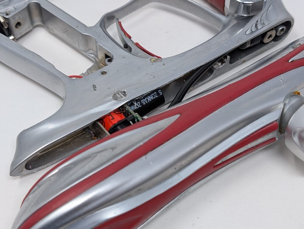 Body separated from grip frame, front banjo fitting visible